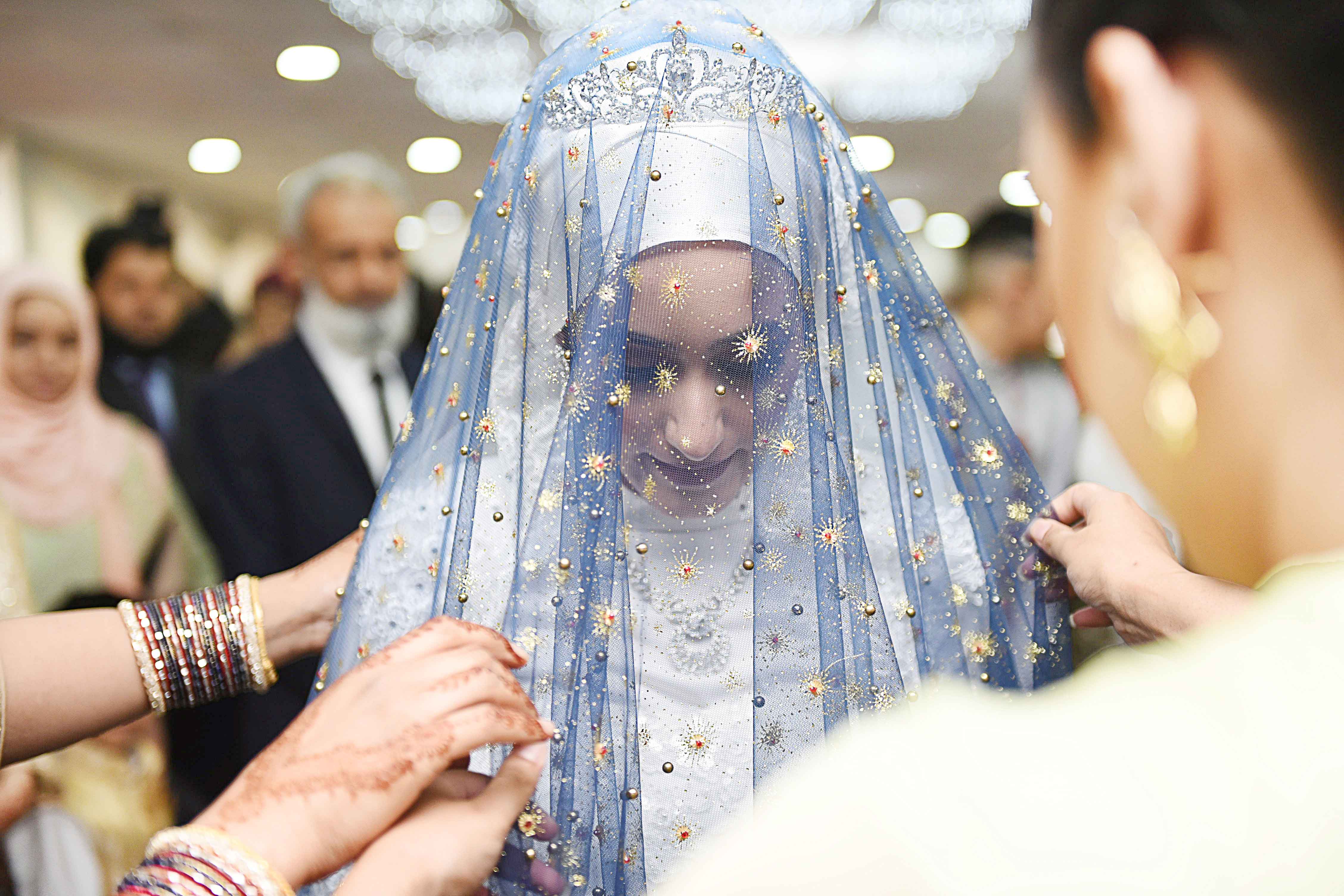 Bride with blue veil, embarking on a new journey