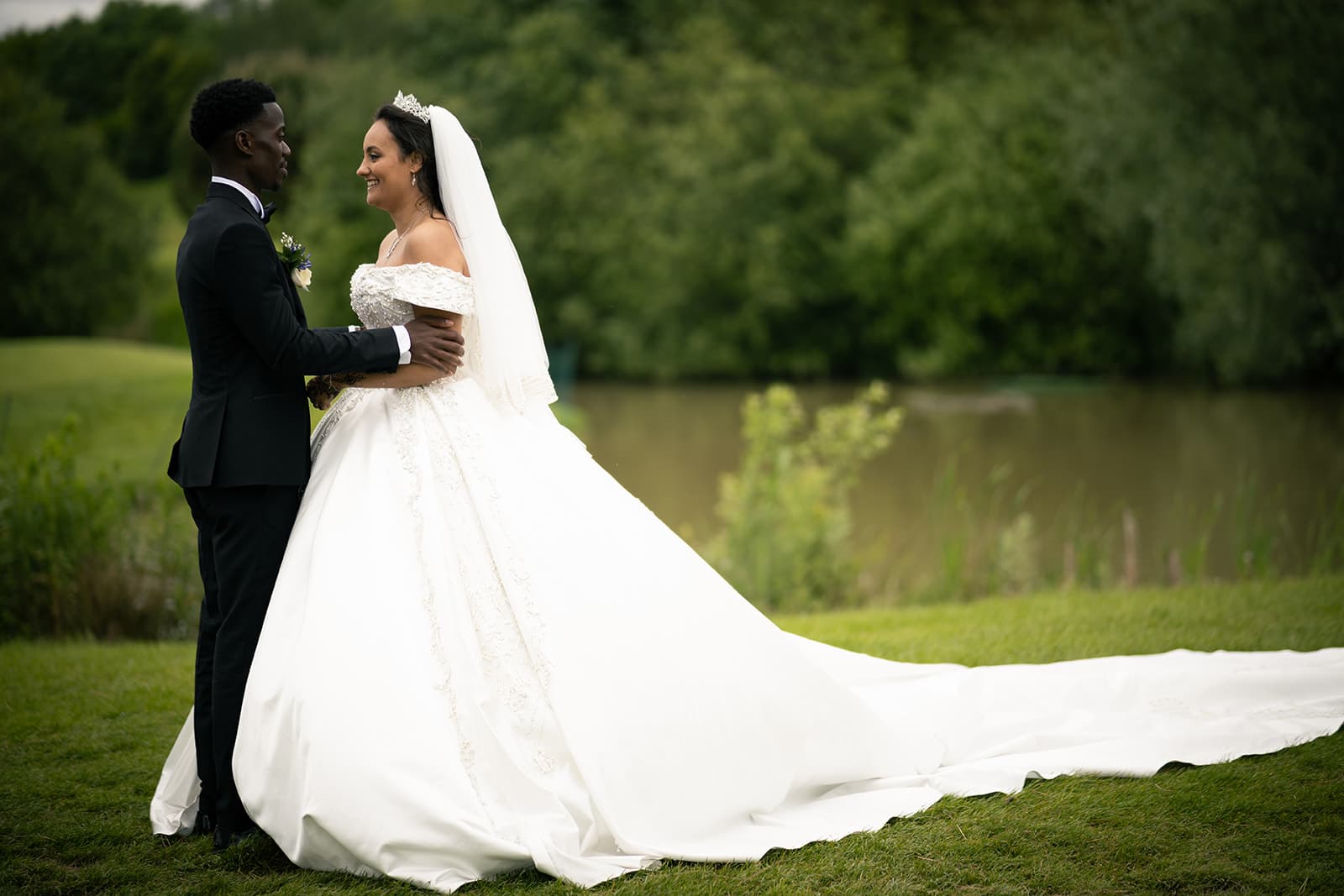 The bride and groom stare into each other's eyes